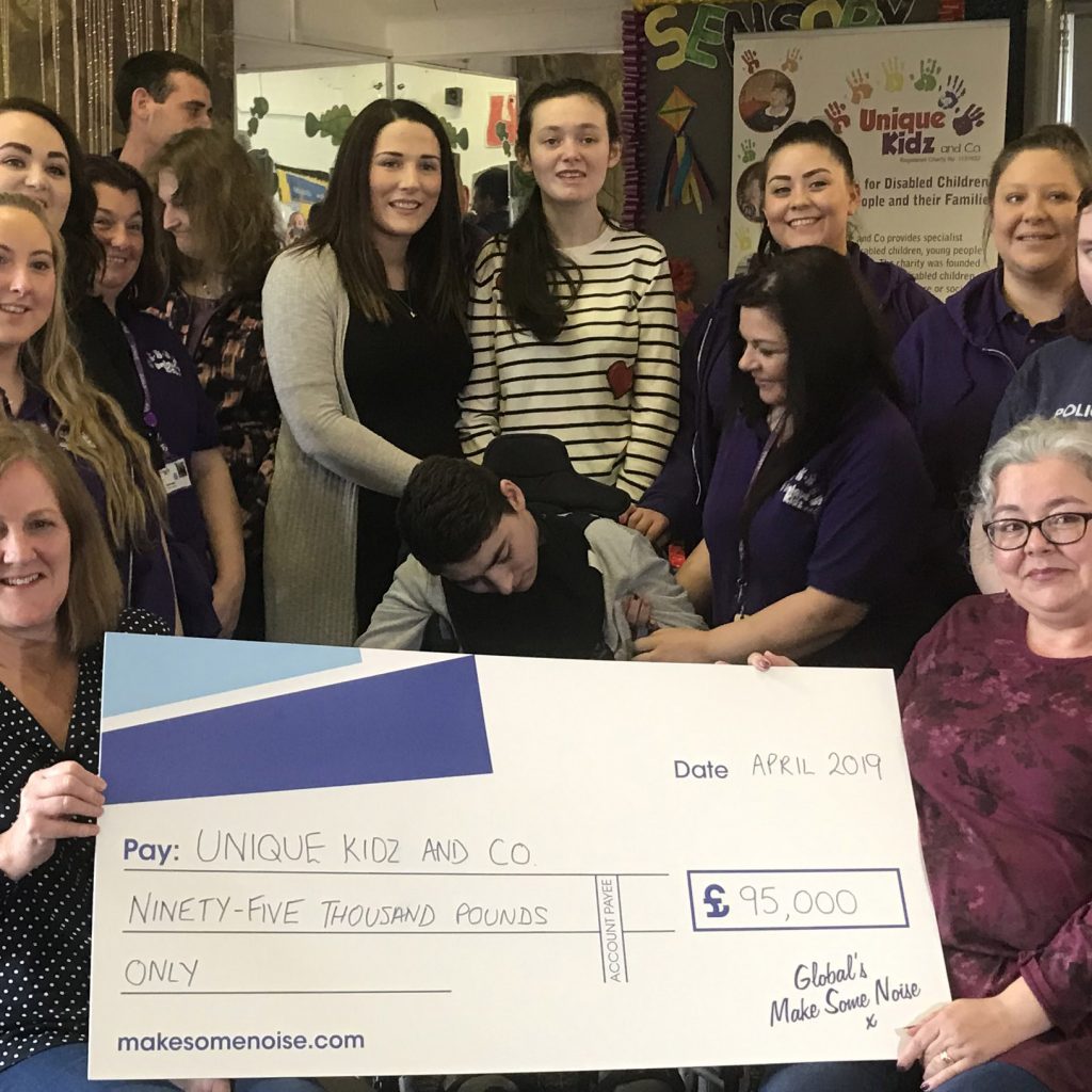 Unique Kidz and Co receive cheque fro £95,000 from Global's Make Some Noise